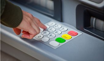 cropped-hand-of-man-using-atm-673157317-97678596653e4813a32ccf971906c082__1_