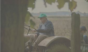 old-farmer-on-the-tractor-filippo-carlot